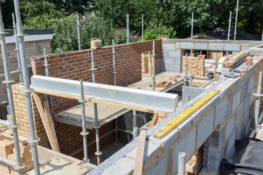 Structural steel beam installation during a building project in Andover